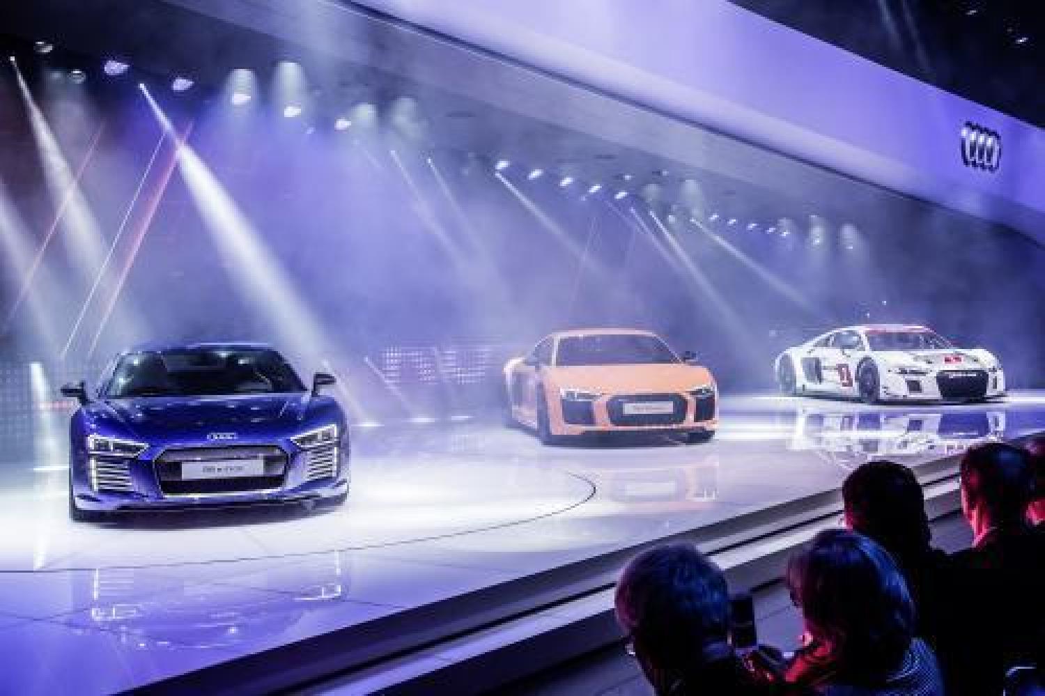 Tom Kristensen, nine-time winner at Le Mans, arrives at the Geneva Motor Show in the Audi R8!