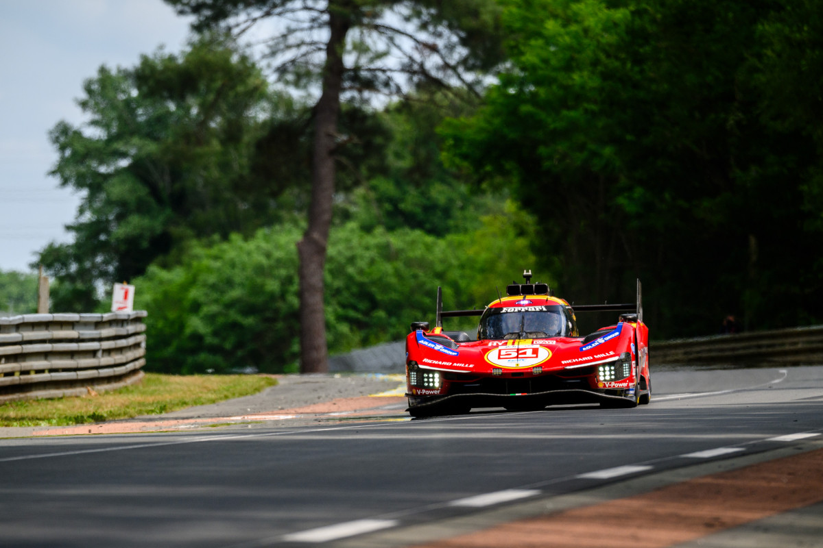 The #51 Ferrari hunting down the Toyota